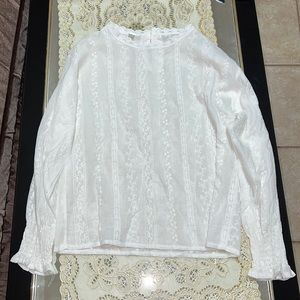 White embroidered eyelet long-sleeved blouse